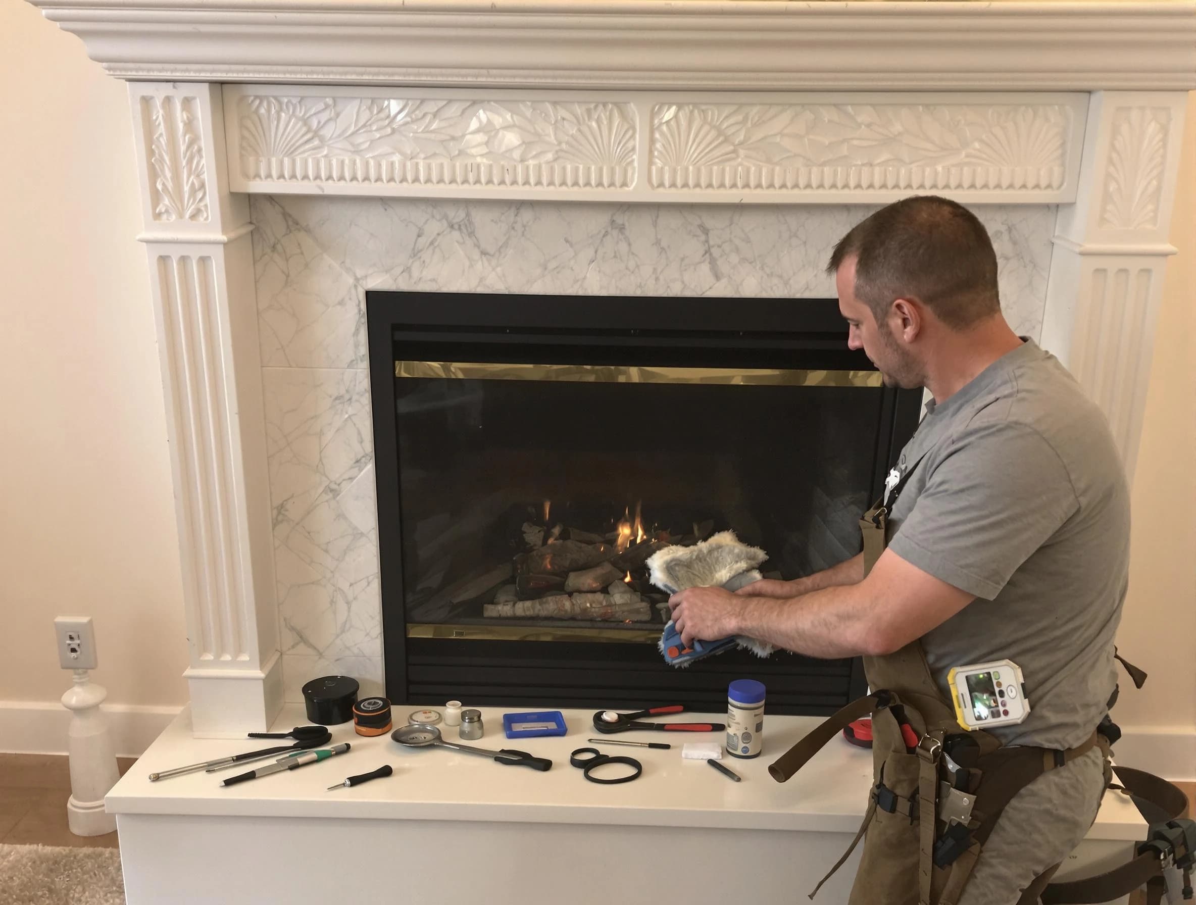 West Bountiful Chimney Sweep performing fireplace maintenance in West Bountiful, UT